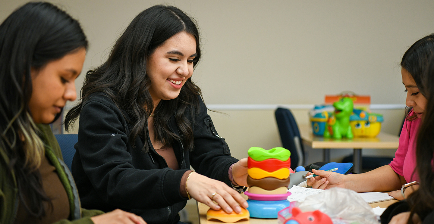 Female students in a classroom.