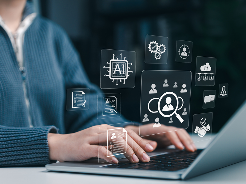 person using a laptop for an AI job search