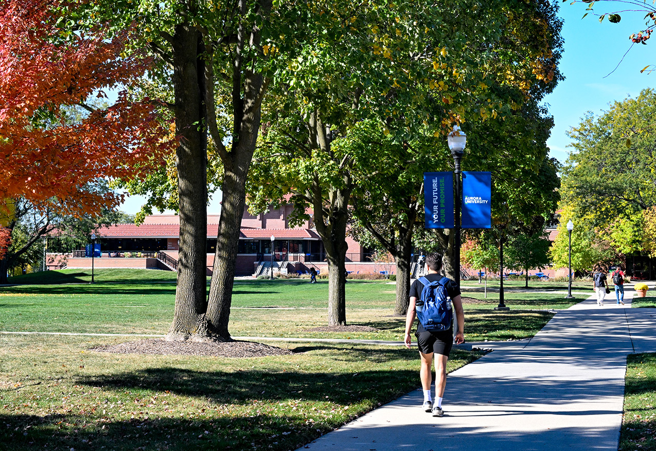 AU students walking and talking near the Quad.