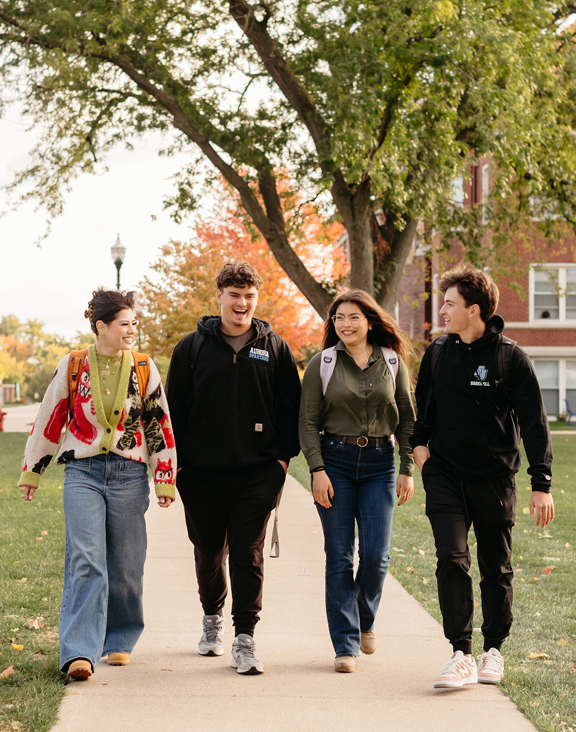 Four students walking.